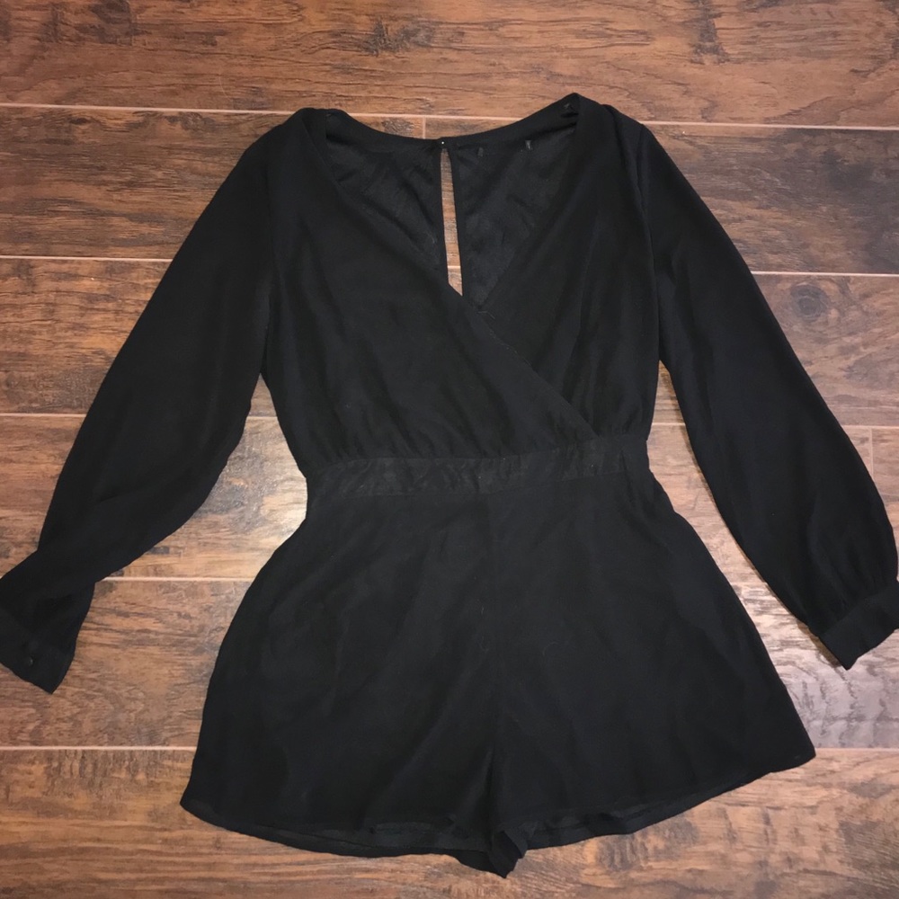 Black long sleeve romper with open back